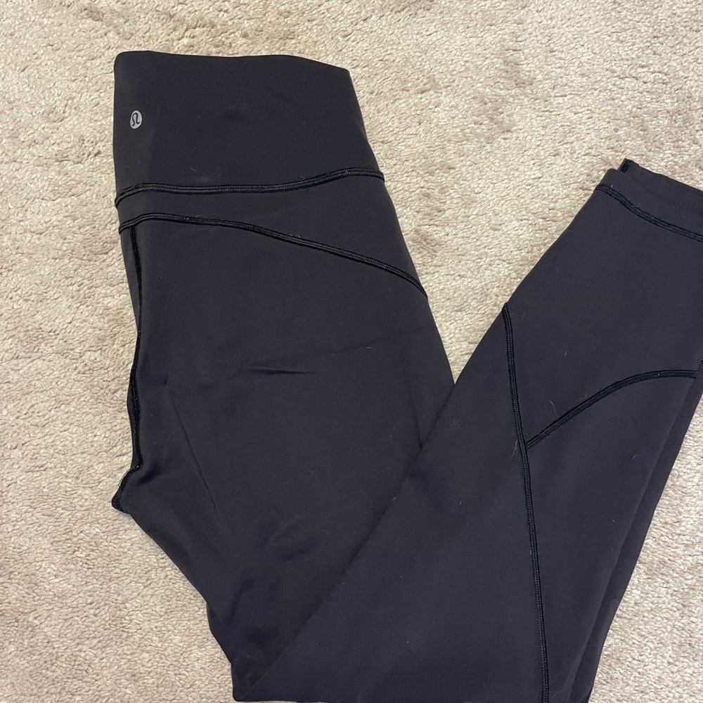 Size 10 black lululemon in movement leggings